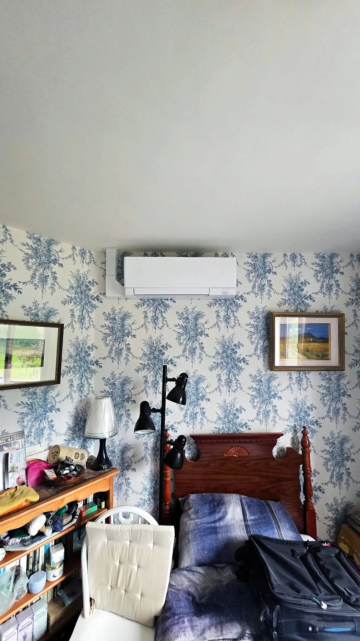 Wall-mounted air conditioner in a bedroom