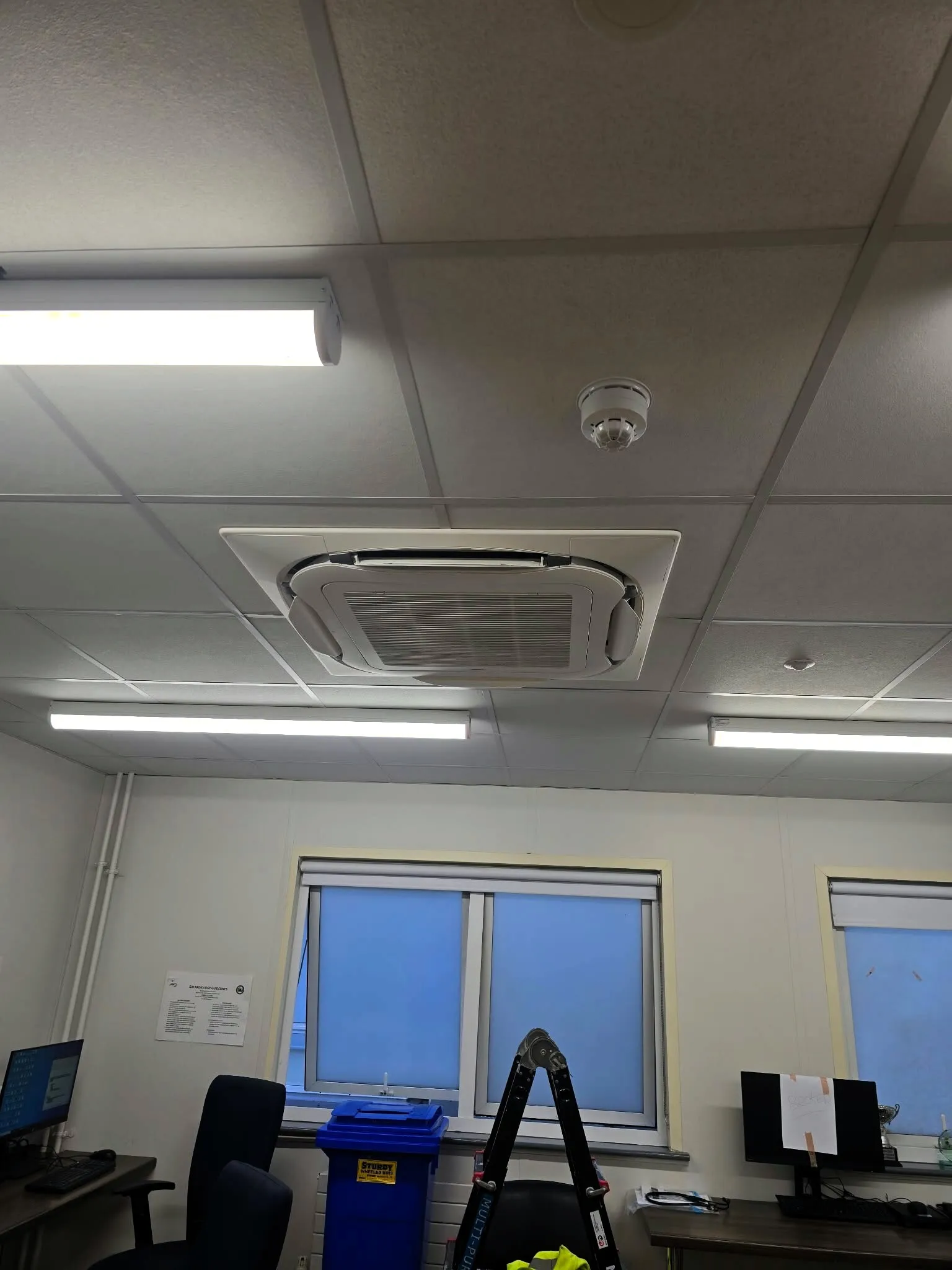 Ceiling cassette air conditioning unit in an office