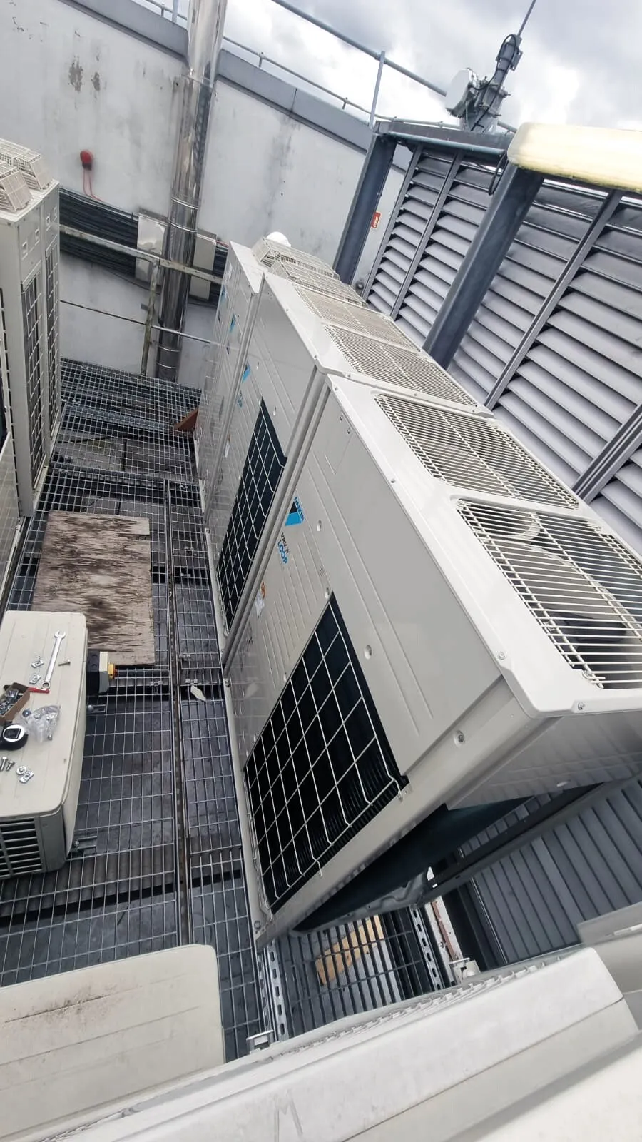 Daikin outdoor units on a rooftop plant deck