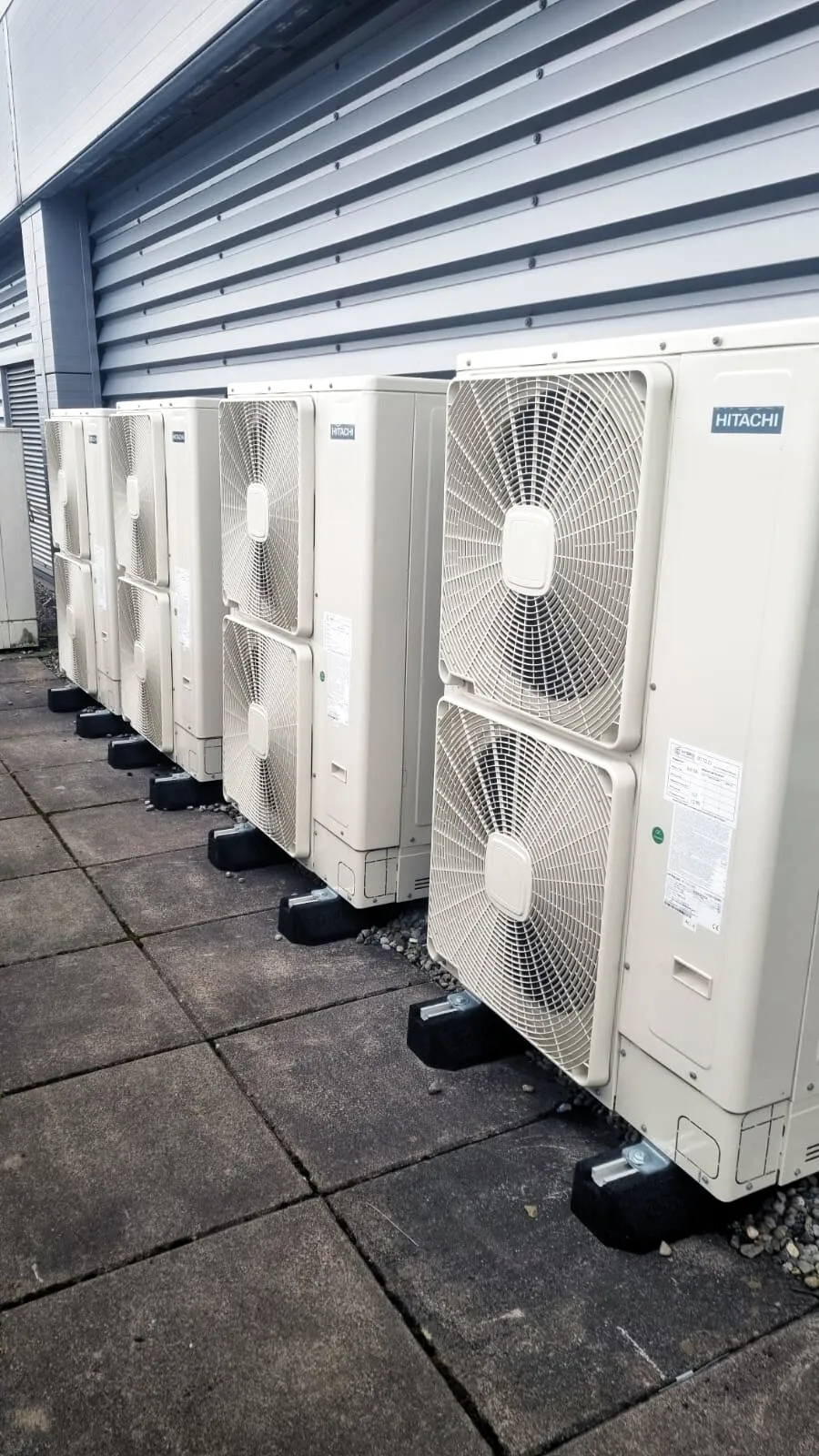 Hitachi outdoor units on a rooftop
