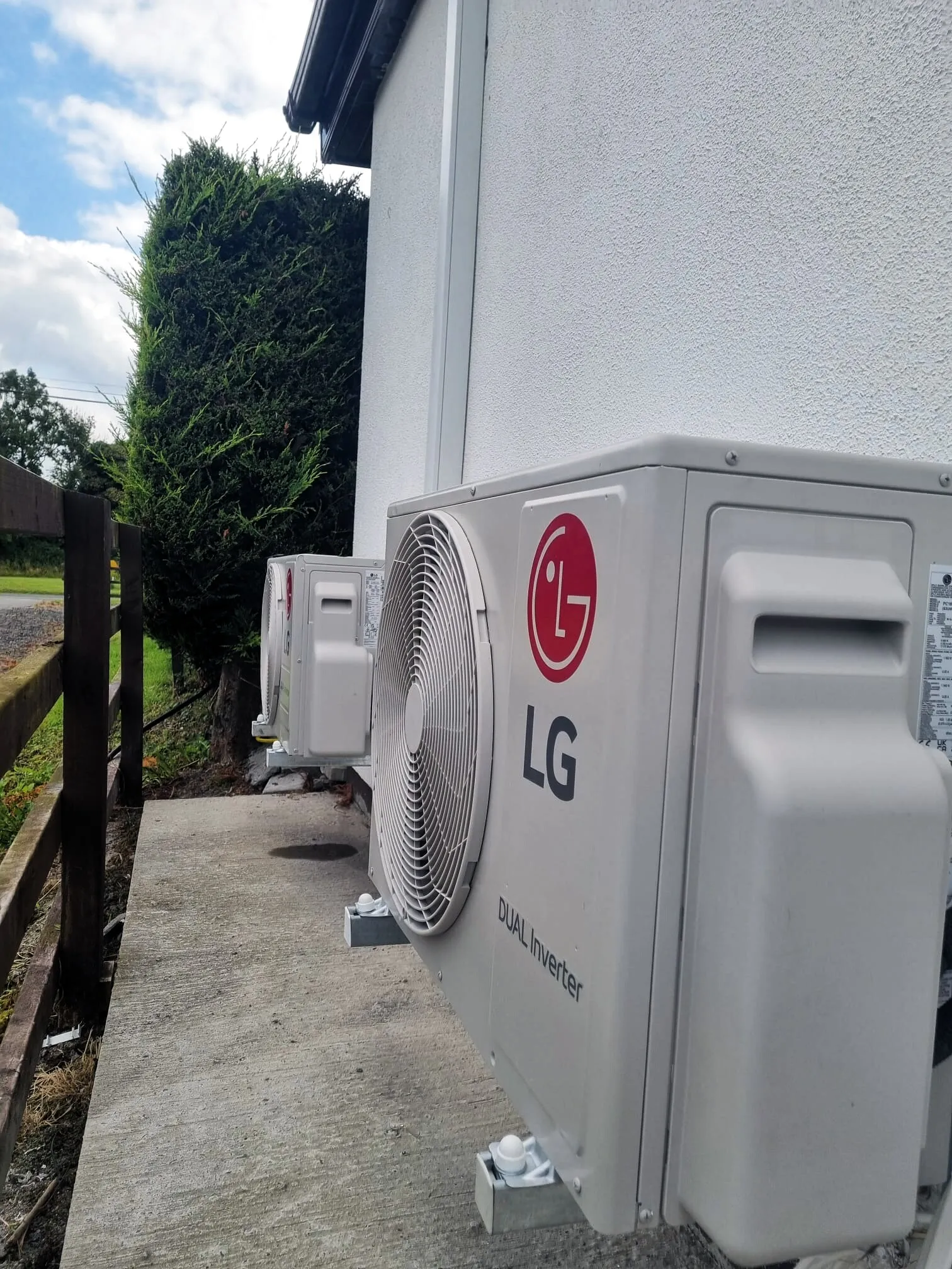 LG outdoor unit installed on the side of a house