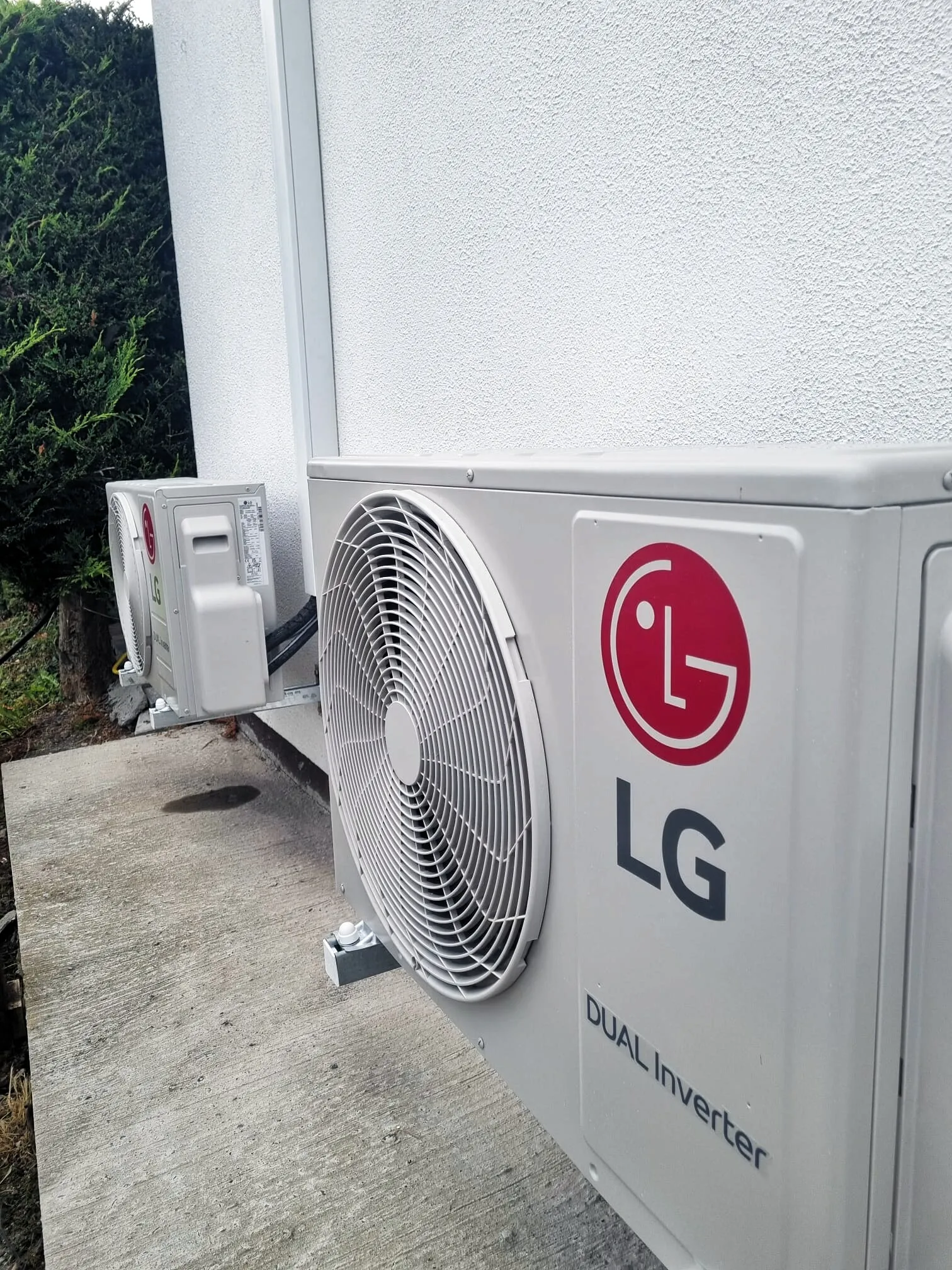 LG Dual Inverter outdoor units mounted on an exterior wall