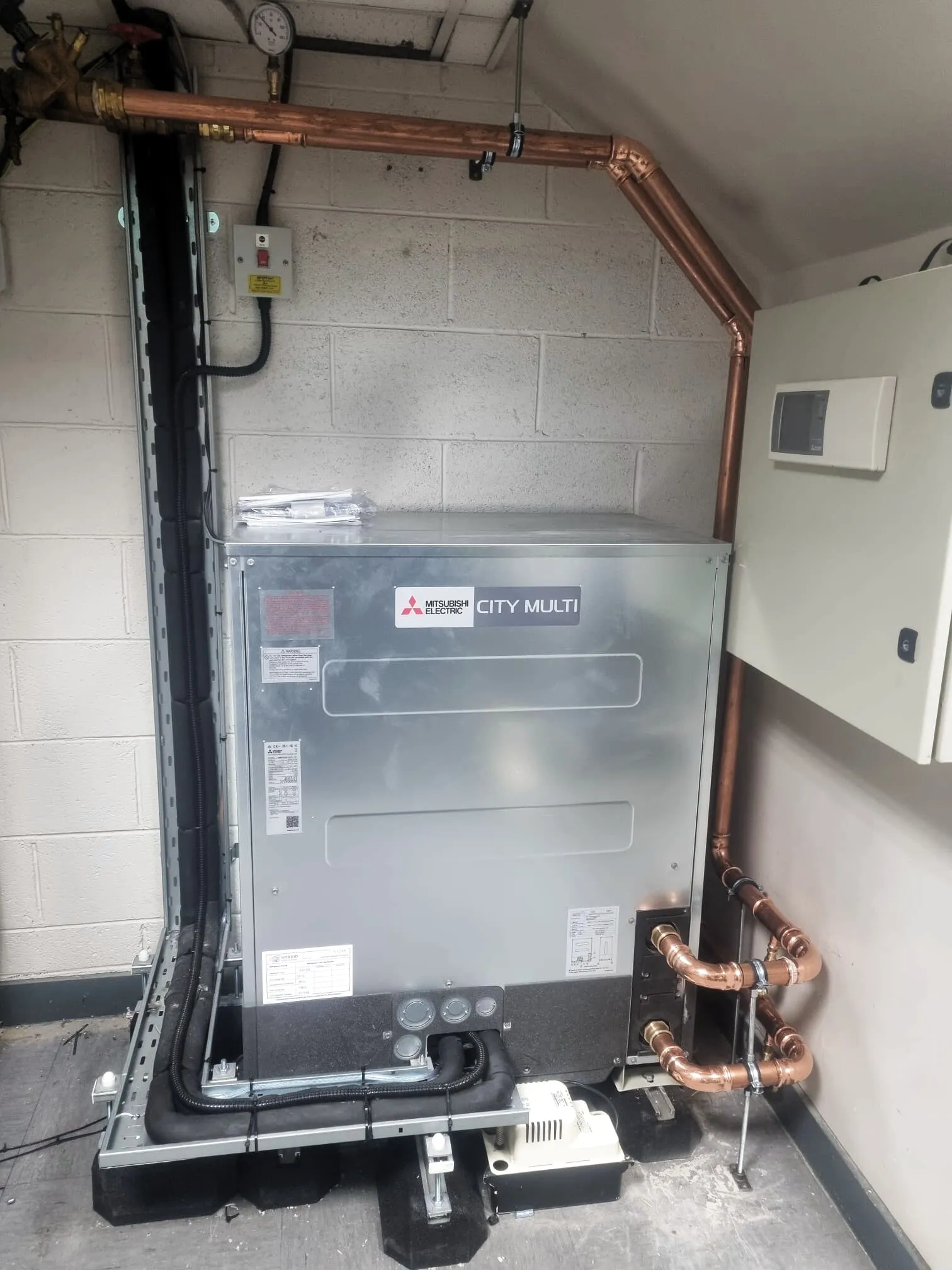 Mitsubishi City Multi unit with copper pipework in a plant room