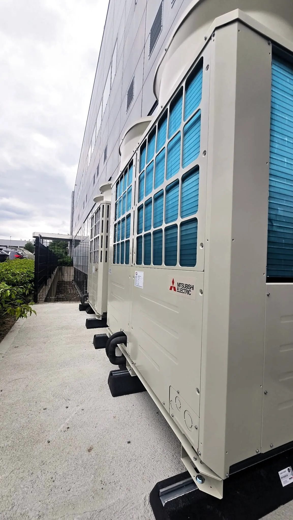 Row of Mitsubishi VRF outdoor units