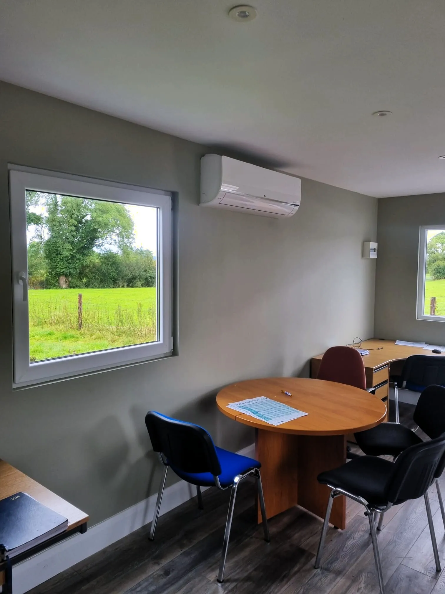 Split system air conditioning unit in an office